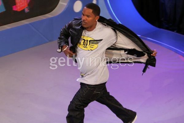 Oscar-winning actor and singer Jamie Foxx flaunts his Rich Yung tee in a show.